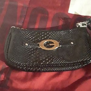 A cute little guess hand bag